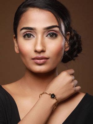 Buy Aatmana Black Gold-Plated Stainless Steel Flower Shaped Bracelet Online