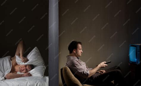 Premium Photo | Man at night can't fall asleep because of the noisy ...