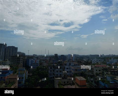 Bangladesh capital Dhaka city landscape on a sunny morning. Blue sky ...