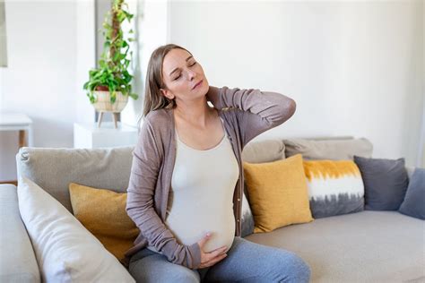 Easing Upper Back Pain for Expecting Moms - Kaly