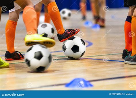 Indoor Soccer Class for Kids at School Sports Hall. Children Kicking ...