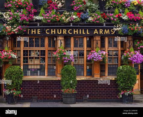 London, United Kingdom - June 25, 2024: Fuller’s Churchill Arms is a ...