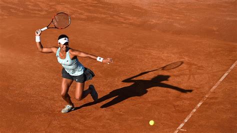 Heather Watson suffered a heavy defeat to Carla Suarez Navarro at the ...