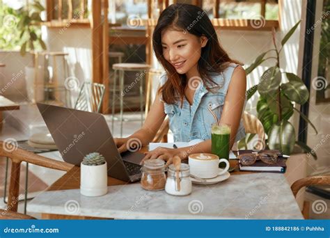 Online Job. Girl with Laptop at Cafe. Business Woman in Jeans Outfit ...