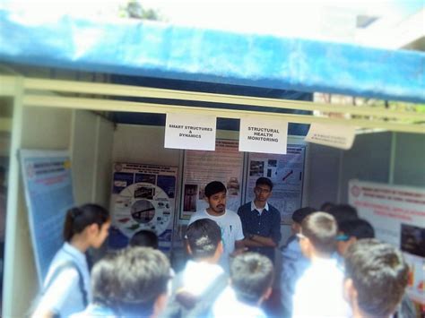 Mr. Anajaneya Dixit explaining to school students