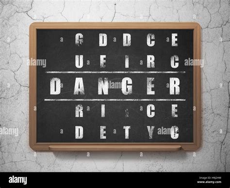 Security concept: Danger in Crossword Puzzle Stock Photo - Alamy