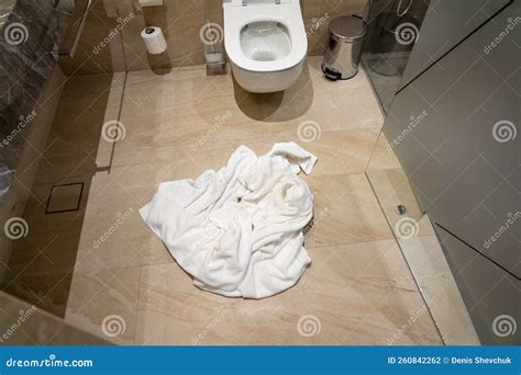 Crumpled Used Towel on the Bathroom Floor Stock Photo - Image of ...