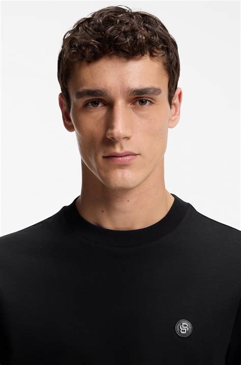 BOSS - Regular-fit cotton T-shirt with subtle logo detail - Black