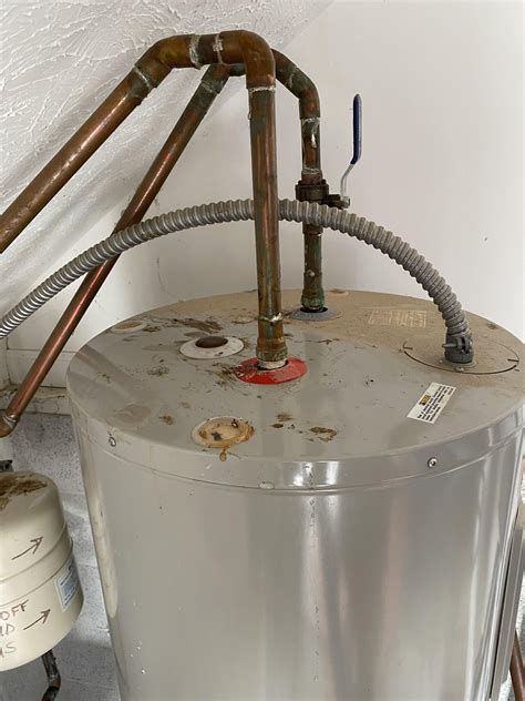 Water heater leak on top : r/Plumbing