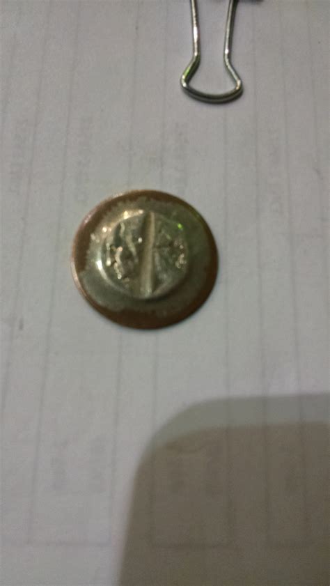 Messed up quarter a guy got at work. : coins