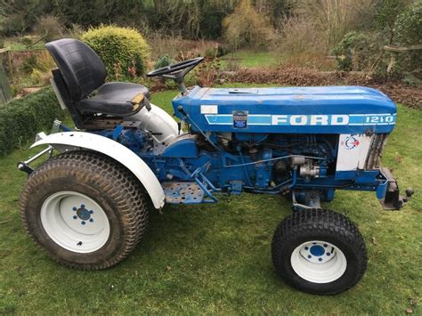 Image result for Ford 1210 Compact Tractor