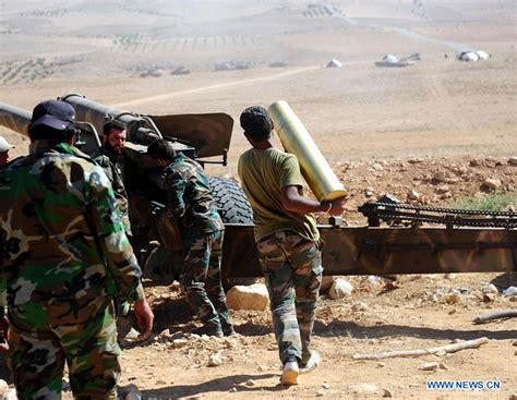 黎巴嫩真主党与叙利亚政府军联合行动打击IS_军事_中国网