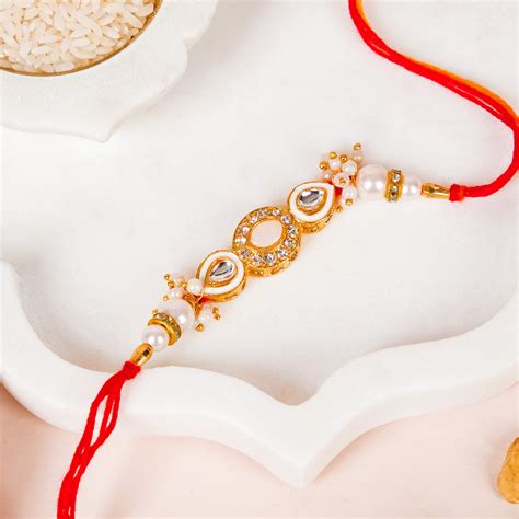 Stone And Pearl White Kundan Rakhi Set For Couple Online - Premium Gift ...