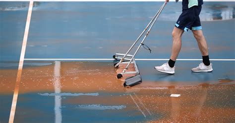 Muddy courts stops play: After smog, wind and rain, a new weather ...