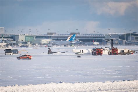 All on Board Survive After Plane Crashes and Overturns at Toronto ...
