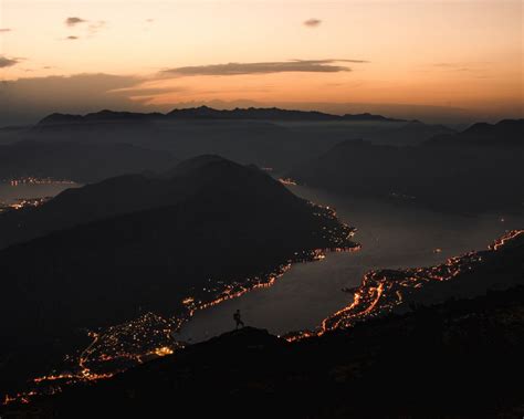 Download wallpaper 1280x1024 mountains, coast, aerial view, city, night ...