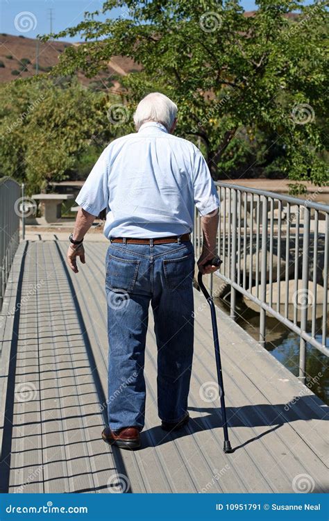 Old Man Walking With Cane