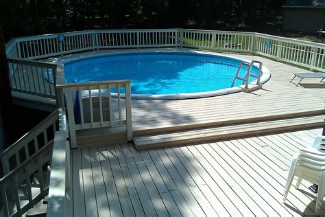 Above-ground-pools-designs-with-white-wooden-deck-ideas | Best above ...