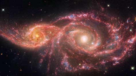 Space photo of the week: Stare into the 'bloodshot eyes' of a haunting galaxy pair | Live Science