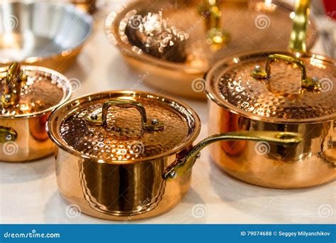 Copper Cookware, Pots and Pans are on the Counter in the Store. Stock ...