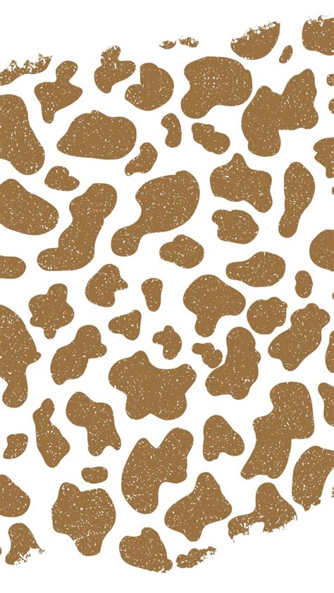 Download A Brown And White Cow Print Pattern Wallpaper | Wallpapers.com