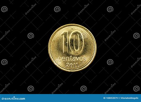 Argentine Gold Ten Centavo Coin Isolated on Black Stock Image - Image ...