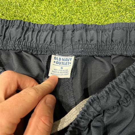 Navy blue and white vintage old navy track... - Depop