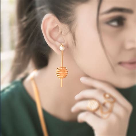 Gold Toned Pearl & Wrapped Metal Pendulum Earrings – Suhani Pittie