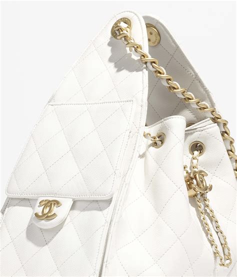 Chanel 25 small handbag, Grained calfskin & gold-tone metal, white ...