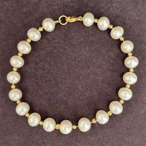 18k Gold Pearl Bracelet(s)