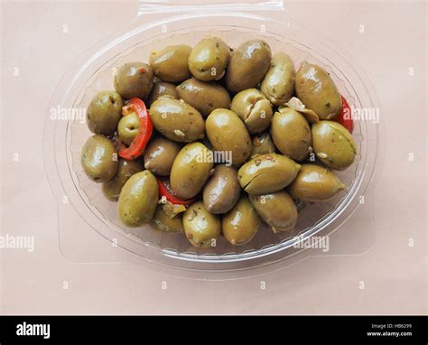 Green olives vegetables Stock Photo - Alamy