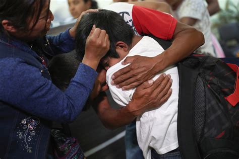 Emotional photos show kids reuniting with their deported parents