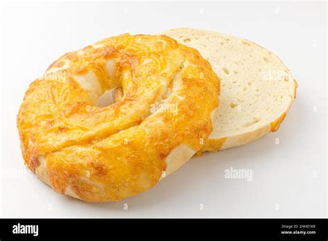 Cheese bagel on white background Stock Photo - Alamy