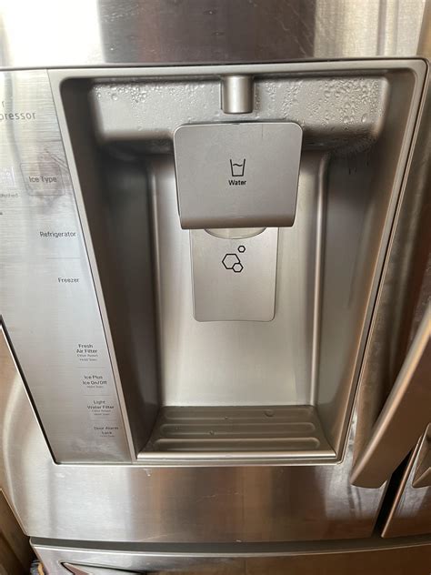 My LG fridge water dispenser/ice maker is sweating from the top. What ...