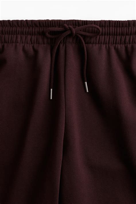 Sweatpants van katoenmix - Bordeauxrood - DAMES | H&M NL