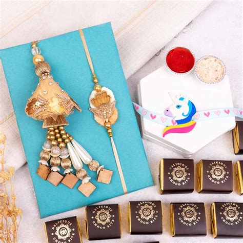 Send Bhaiya Bhabhi Rakhi with Unicorn Rakhi and Chocobite Online ...