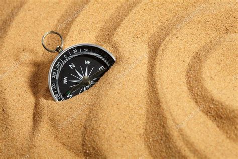 Compass in sand — Stock Photo © strelok #9041045