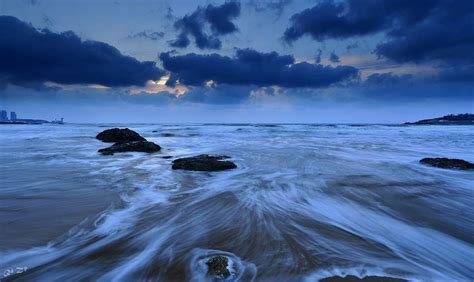 qdll摄影作品 青岛清晨的云与海