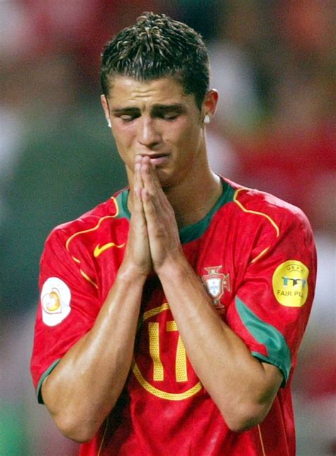 LISBON, PORTUGAL - JULY 4: Cristiano Ronaldo of Portugal praying for a ...