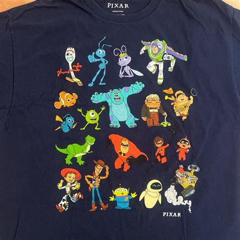 Disney Pixar character T shirt Navy blue... - Depop