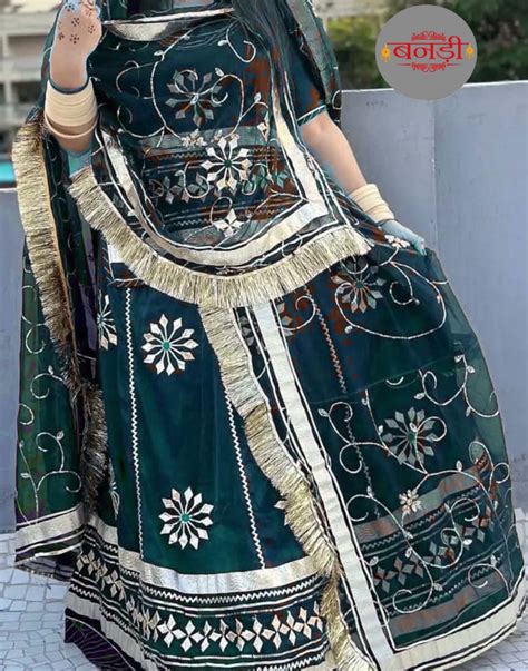 Peacock Green Rajputi Satin Suit with Lace and Zari Work