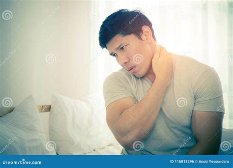 Male Woke Up with Neck Pain from Sleeping Stock Photo - Image of tired, back: 116818396