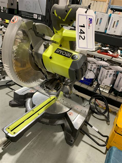 RYOBI TSS103T 10' ELECTRIC SLIDING COMPOUND MITER SAW WITH DUST BAG - Able Auctions