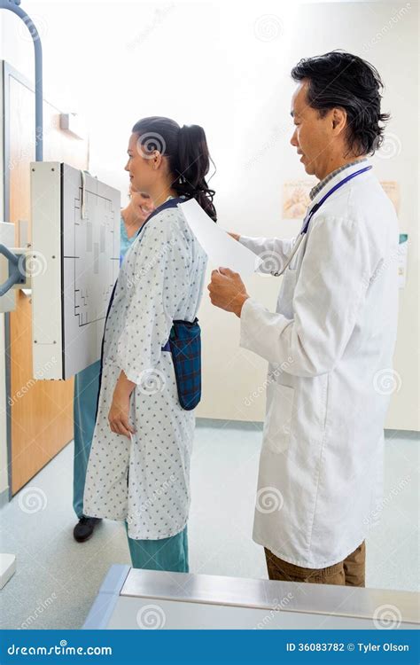 Doctor Preparing Patient for Chest Xray Stock Photo - Image of ...