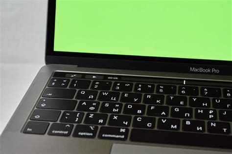 Download MacBook on a Green Screen Wallpaper | Wallpapers.com