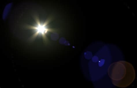 Lens flare glow light effect on black rays light effects overlays or ...