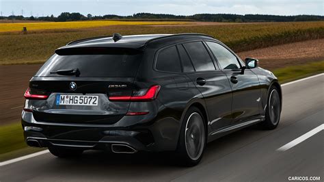 2020 BMW M340i xDrive Touring (Color: Black Sapphire Metallic) | Rear Three-Quarter