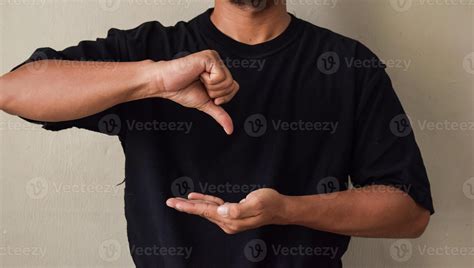 Sign Language man interpreter gesturing in sign language on gray ...