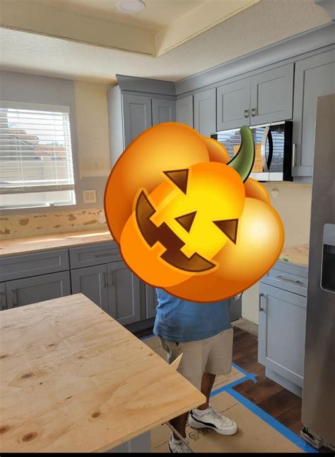 Help. My cabinets look blue. Will painting my walls white help make ...