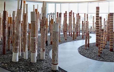 Aboriginal Funeral Poles: Traditional Memorial Art & Cultural Practices
